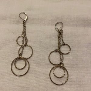 Silver toned dangle pierced earrings